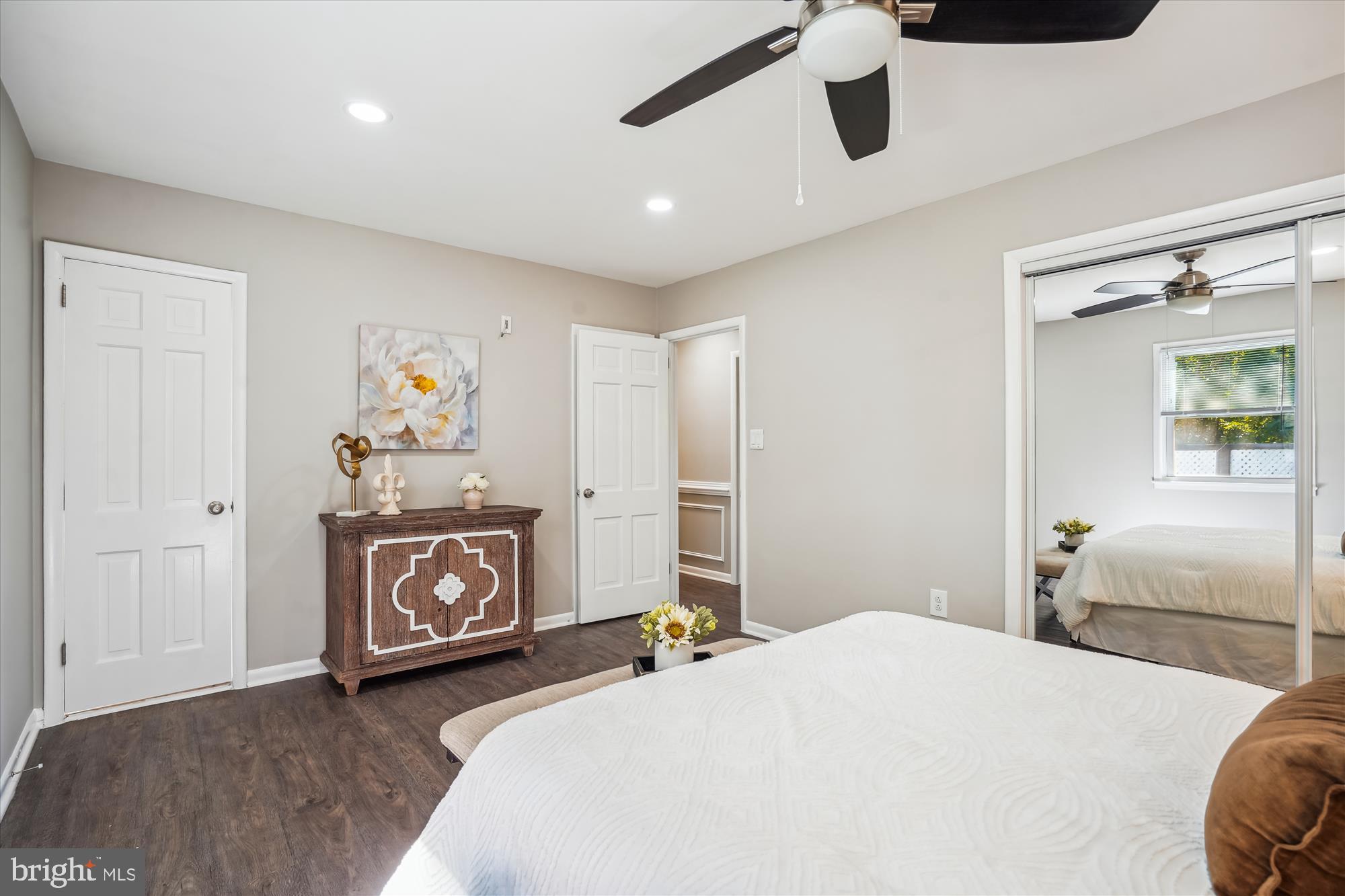 5742 Rolling Road Burke, VA 22015 - Photo 30 of 53 a bedroom with a bed and a tv