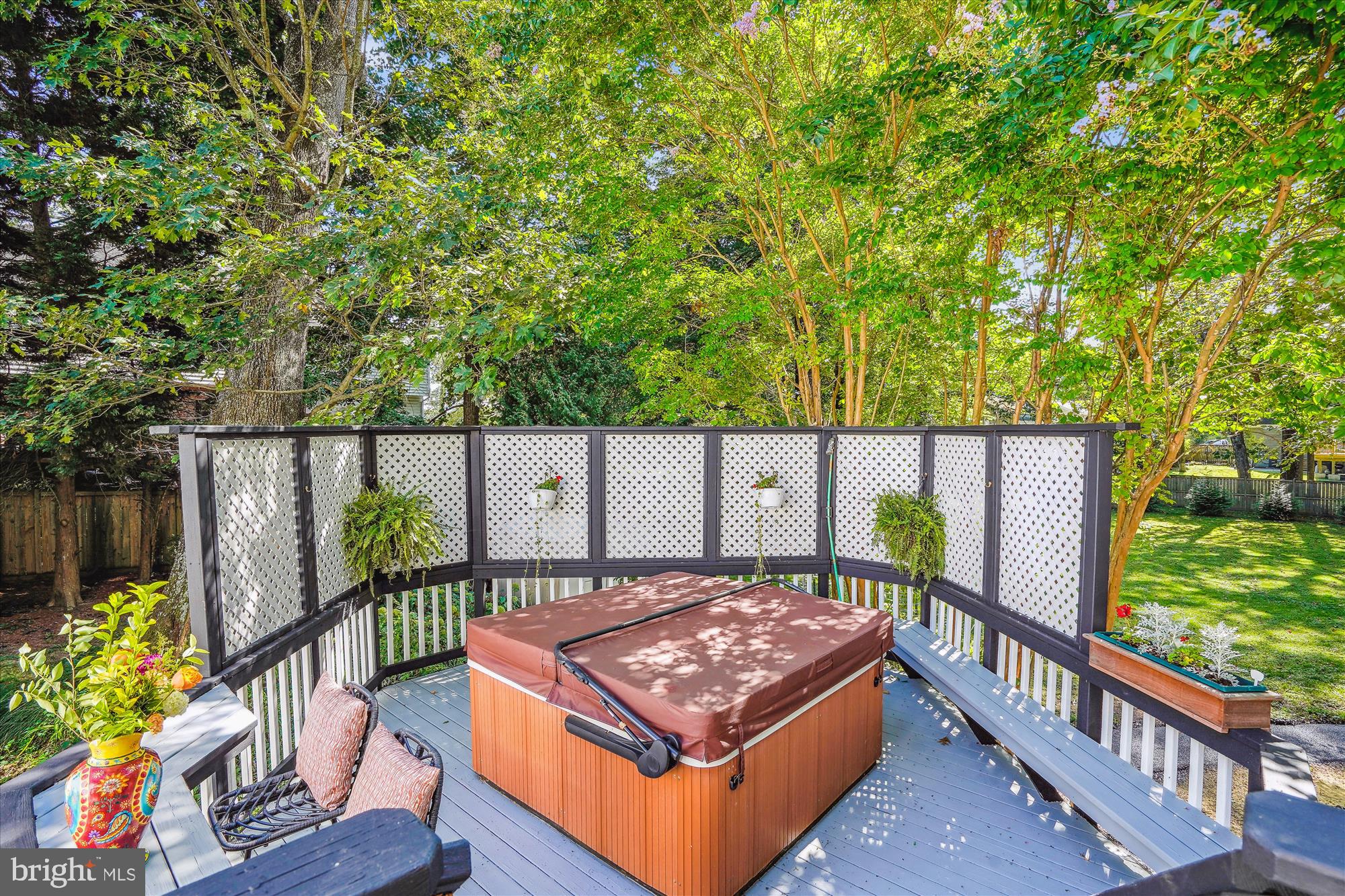 5742 Rolling Road Burke, VA 22015 - Photo 8 of 53 a view of a backyard with wooden fence