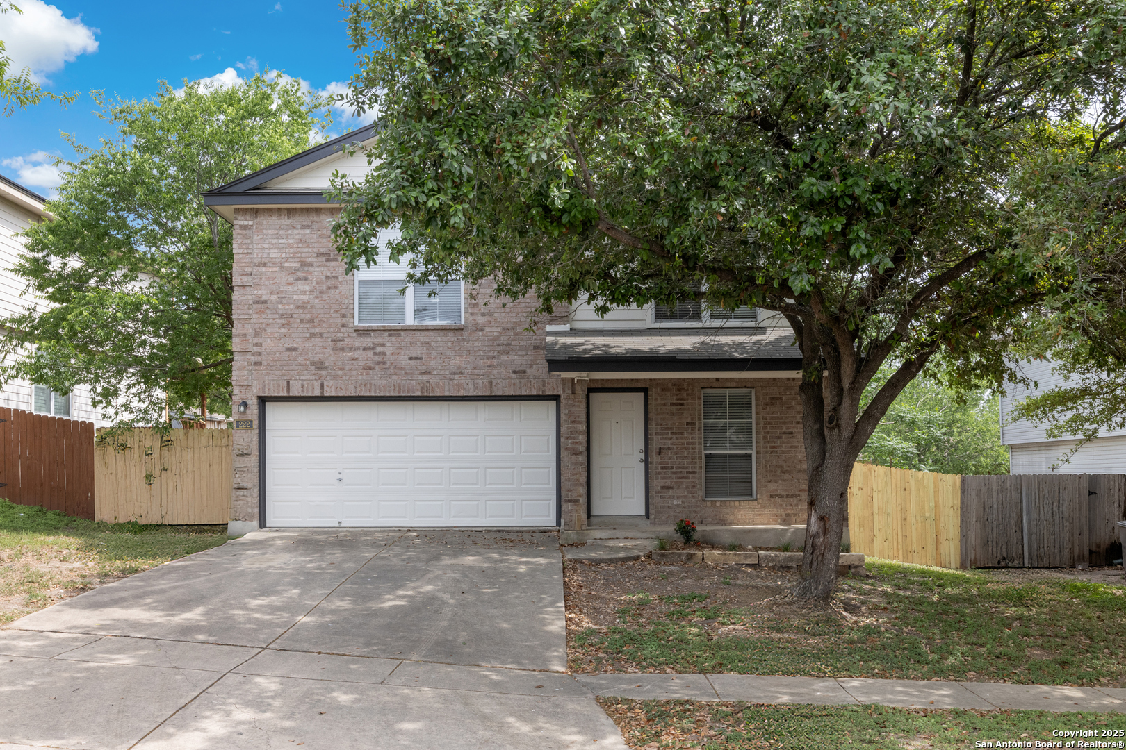 a front view of house with yard
