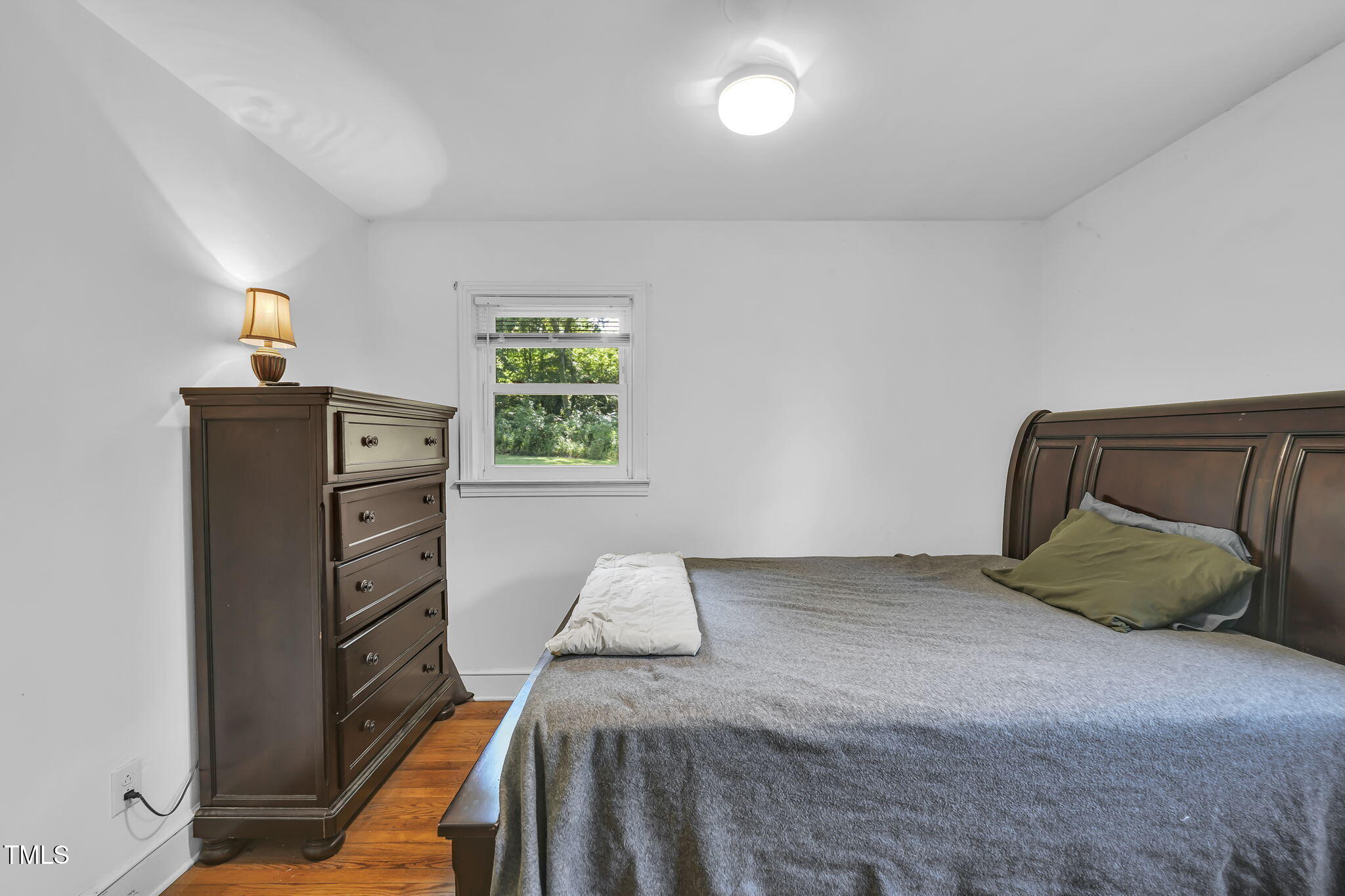 483 Allison Road Ruffin, NC 27326 - Photo 14 of 36 a bedroom with a bed and a window