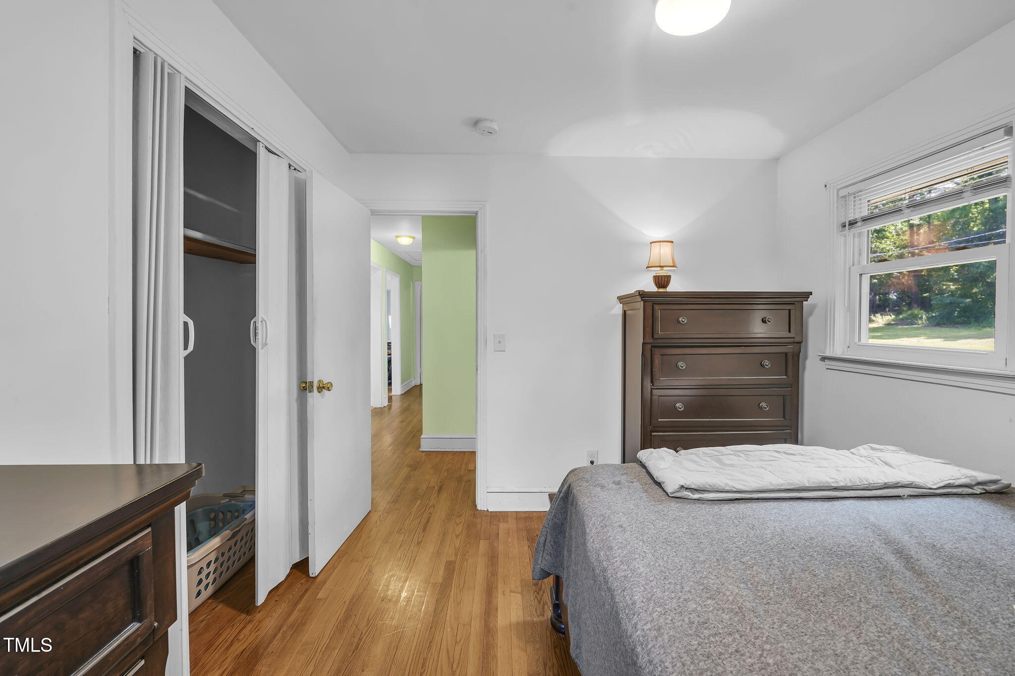 483 Allison Road Ruffin, NC 27326 - Photo 15 of 36 a bedroom with a bed and a dresser