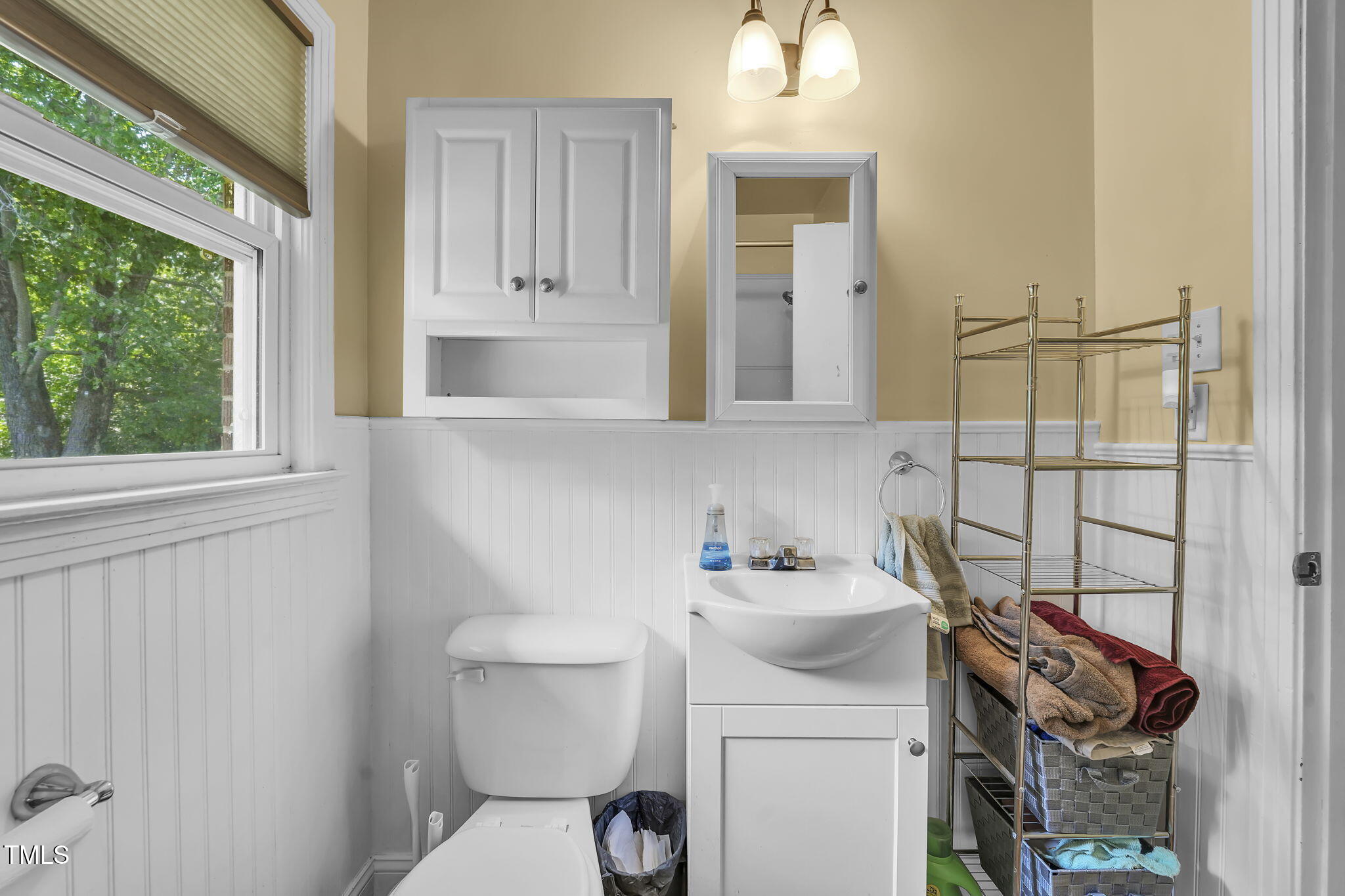 483 Allison Road Ruffin, NC 27326 - Photo 23 of 36 a bathroom with a sink toilet and window