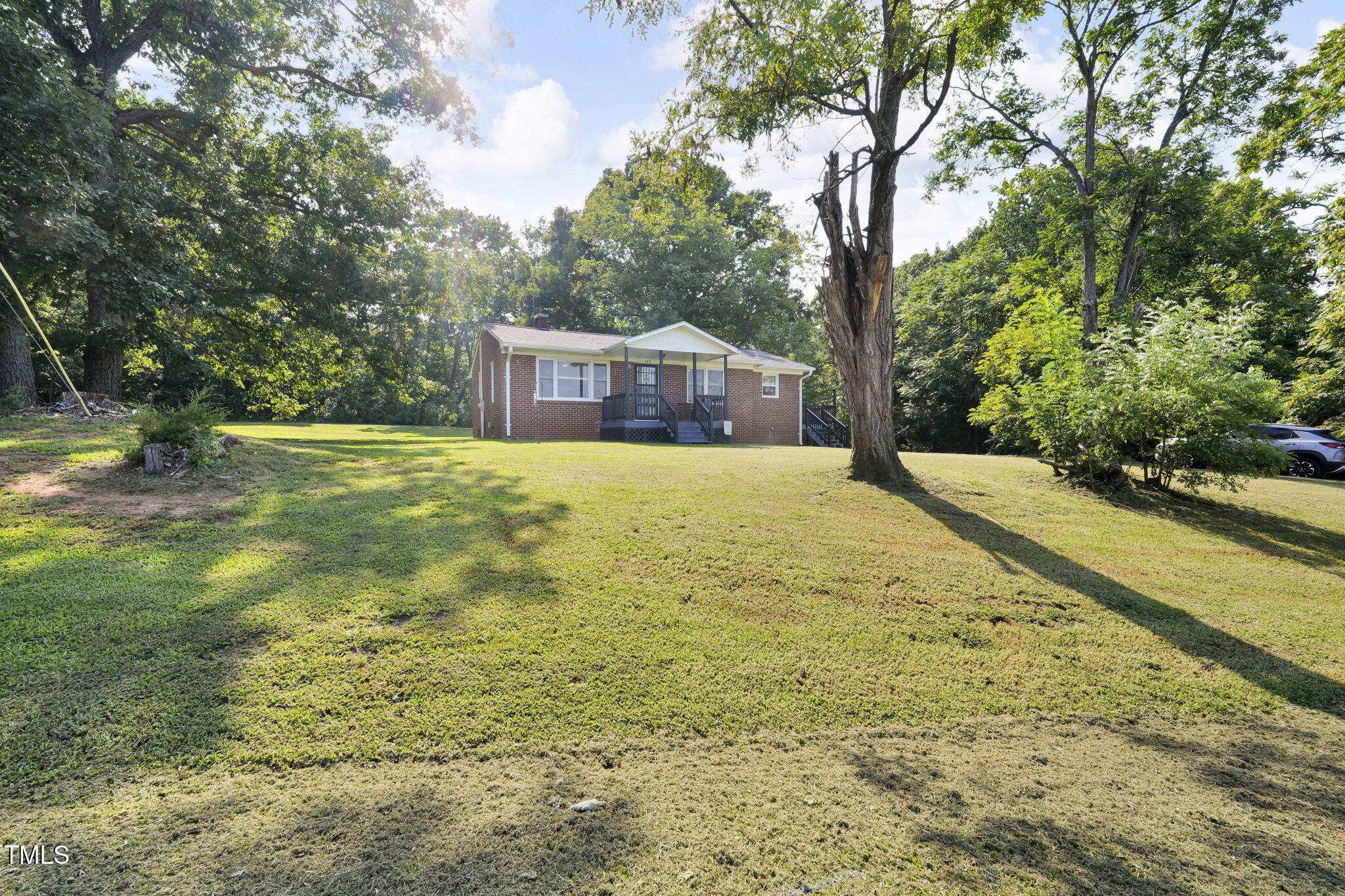 483 Allison Road Ruffin, NC 27326 - Photo 29 of 36 a view of a large garden with large trees