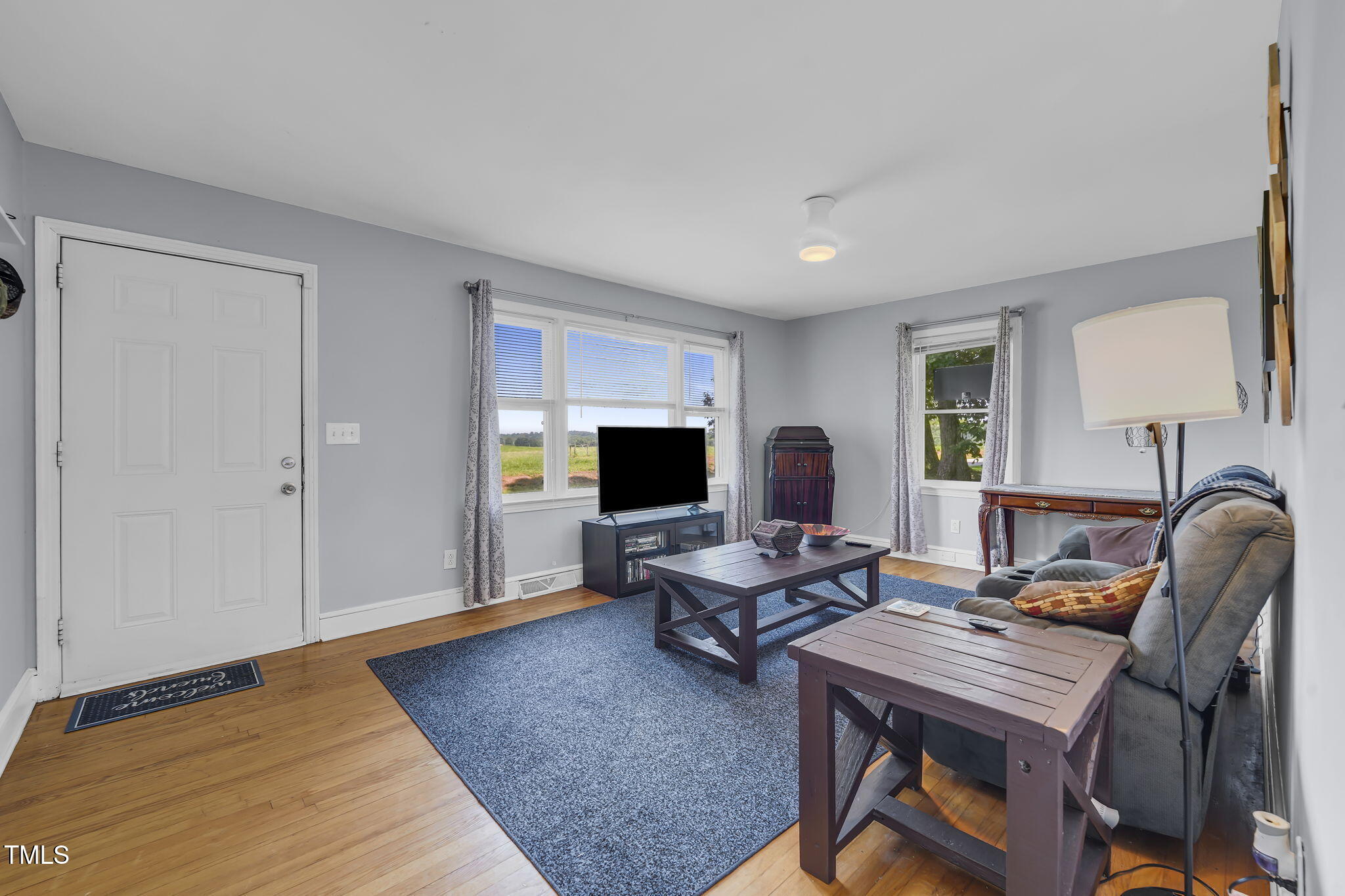 483 Allison Road Ruffin, NC 27326 - Photo 5 of 36 a living room with furniture and a wooden floor