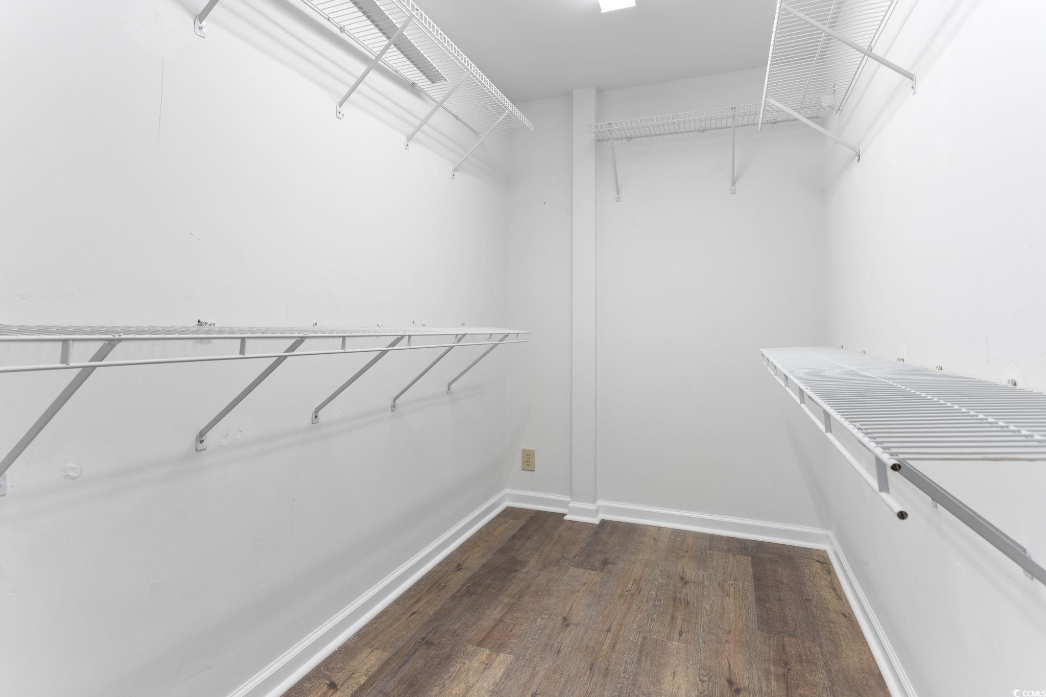 2321 Brick Drive Longs, SC 29568 - Photo 26 of 40 Spacious closet featuring dark wood-style flooring