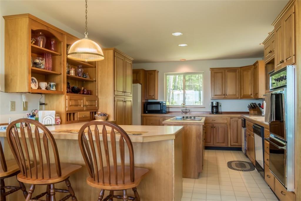 66 Pinecrest Road Harpswell, ME 04079 - Photo 13 of 35 Roomy kitchen has breakfast bar,...