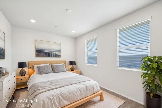 a bathroom with a toilet sink and vanity