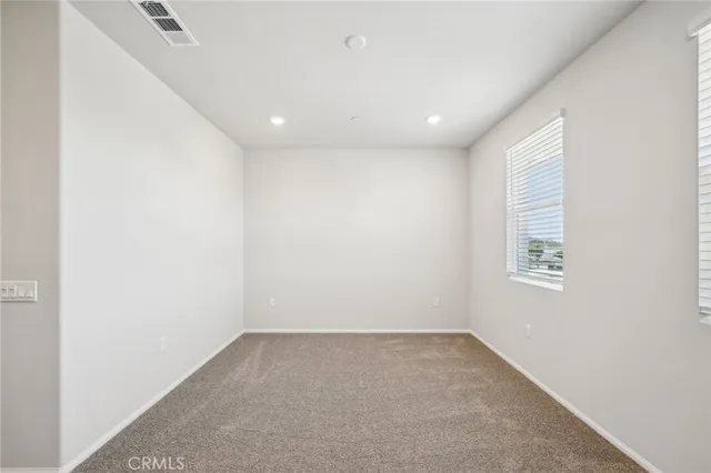 a bathroom with a shower sink vanity and mirror