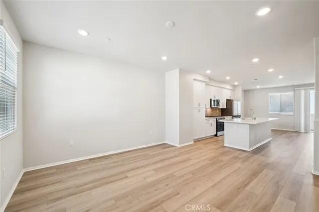 a view of kitchen with wooden floor