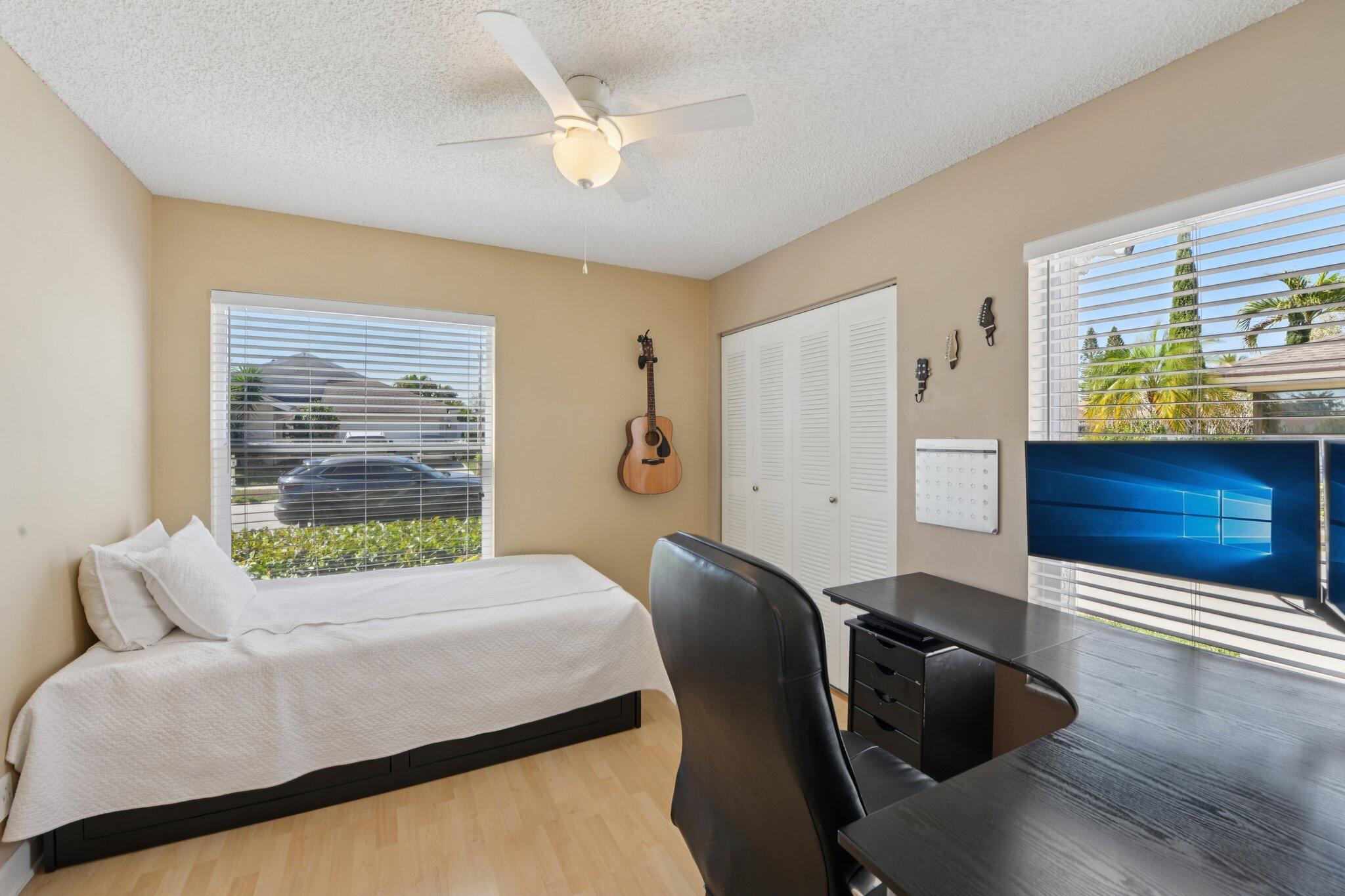 21024 Country Creek Drive Boca Raton, FL 33428 - Photo 26 of 59 a living room with furniture and a large window
