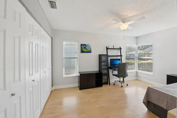 a backyard of a house with seating space