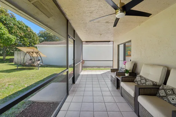 a view of a park with large trees