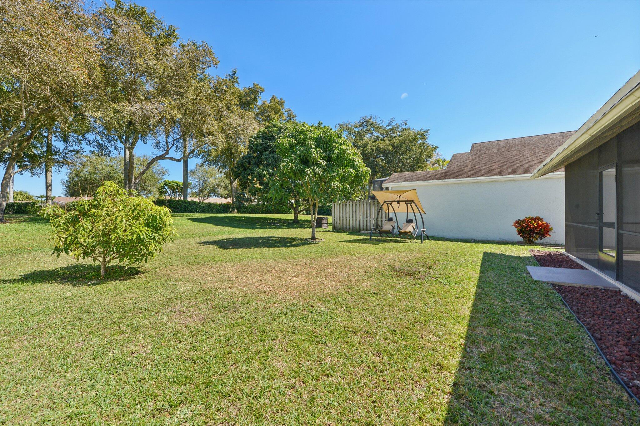21024 Country Creek Drive Boca Raton, FL 33428 - Photo 39 of 59 a view of a house with a yard
