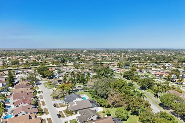 an aerial view of a city with lots of residential buildings