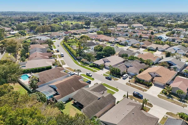 a view of a park with swings and slides