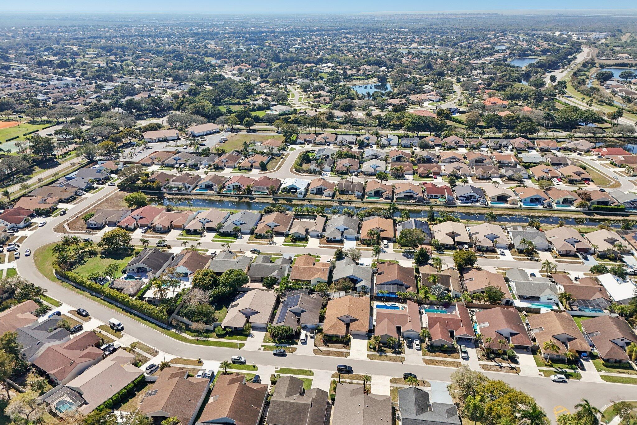 21024 Country Creek Drive Boca Raton, FL 33428 - Photo 51 of 59 an aerial view of residential houses with city view