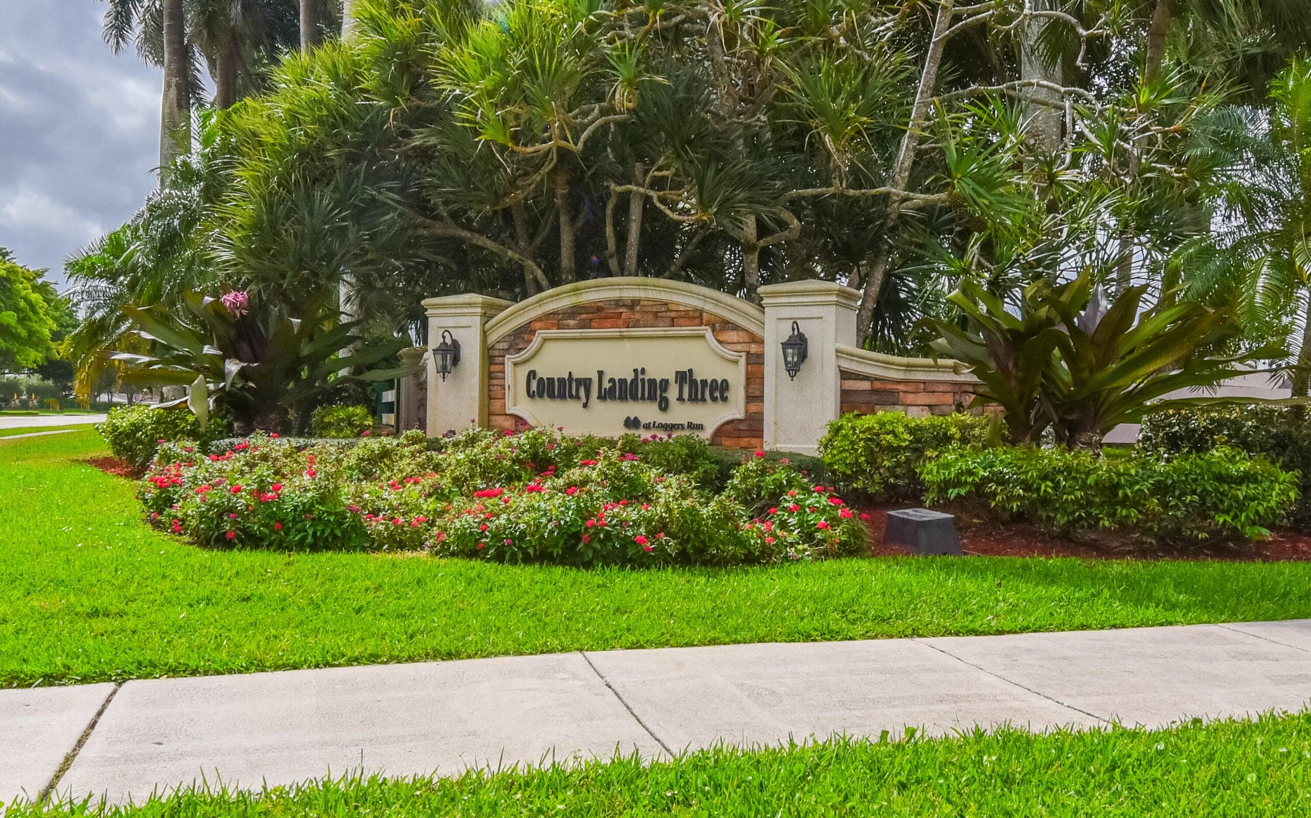 21024 Country Creek Drive Boca Raton, FL 33428 - Photo 53 of 59 a front view of a house with a yard