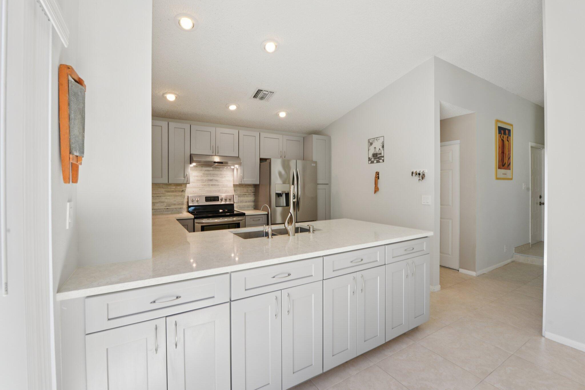 21024 Country Creek Drive Boca Raton, FL 33428 - Photo 7 of 59 11-web-or-mls-Country Creek Dr-S2502-011