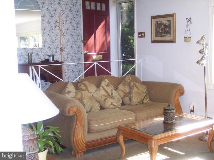 6209 Redwing Road Bethesda, MD 20817 - Photo 11 of 25 a living room with furniture
