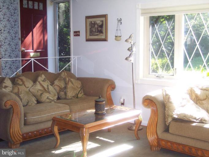6209 Redwing Road Bethesda, MD 20817 - Photo 12 of 25 a living room with furniture and a window