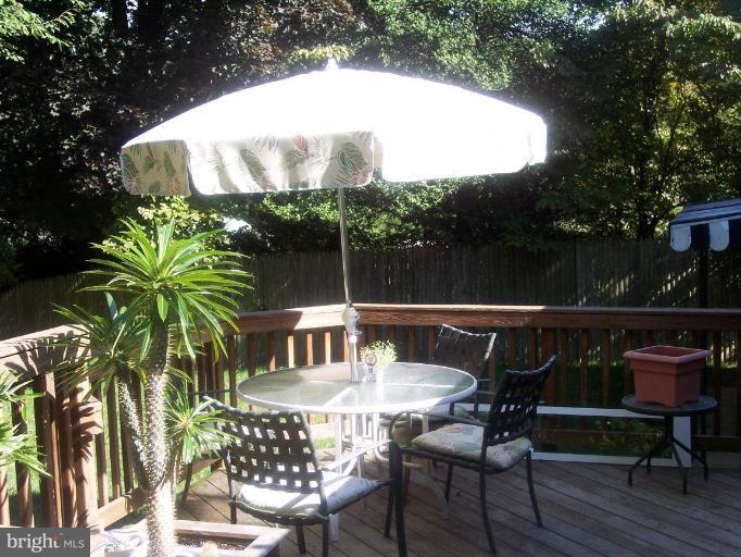 6209 Redwing Road Bethesda, MD 20817 - Photo 19 of 25 a view of a chairs and table in patio