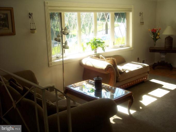 6209 Redwing Road Bethesda, MD 20817 - Photo 21 of 25 a living room with furniture and a window