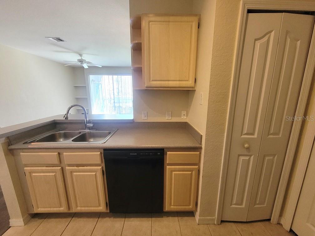 5709 Legacy Crescent Place, Unit 103 Riverview, FL 33578 - Photo 13 of 22 a utility room with dryer and washer