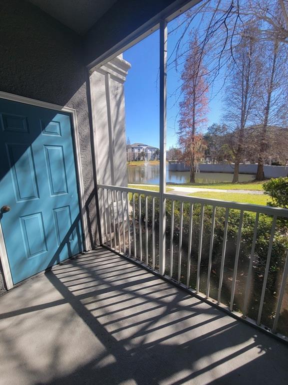 5709 Legacy Crescent Place, Unit 103 Riverview, FL 33578 - Photo 19 of 22 a view of deck with wooden floor and outdoor seating