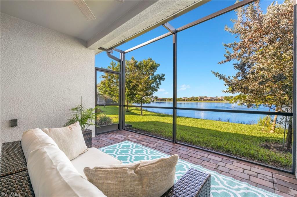 14644 Edgewater Circle Naples, FL 34114 - Photo 22 of 37 a view of swimming pool with a couches