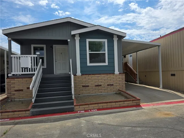 a front view of a house with a garage