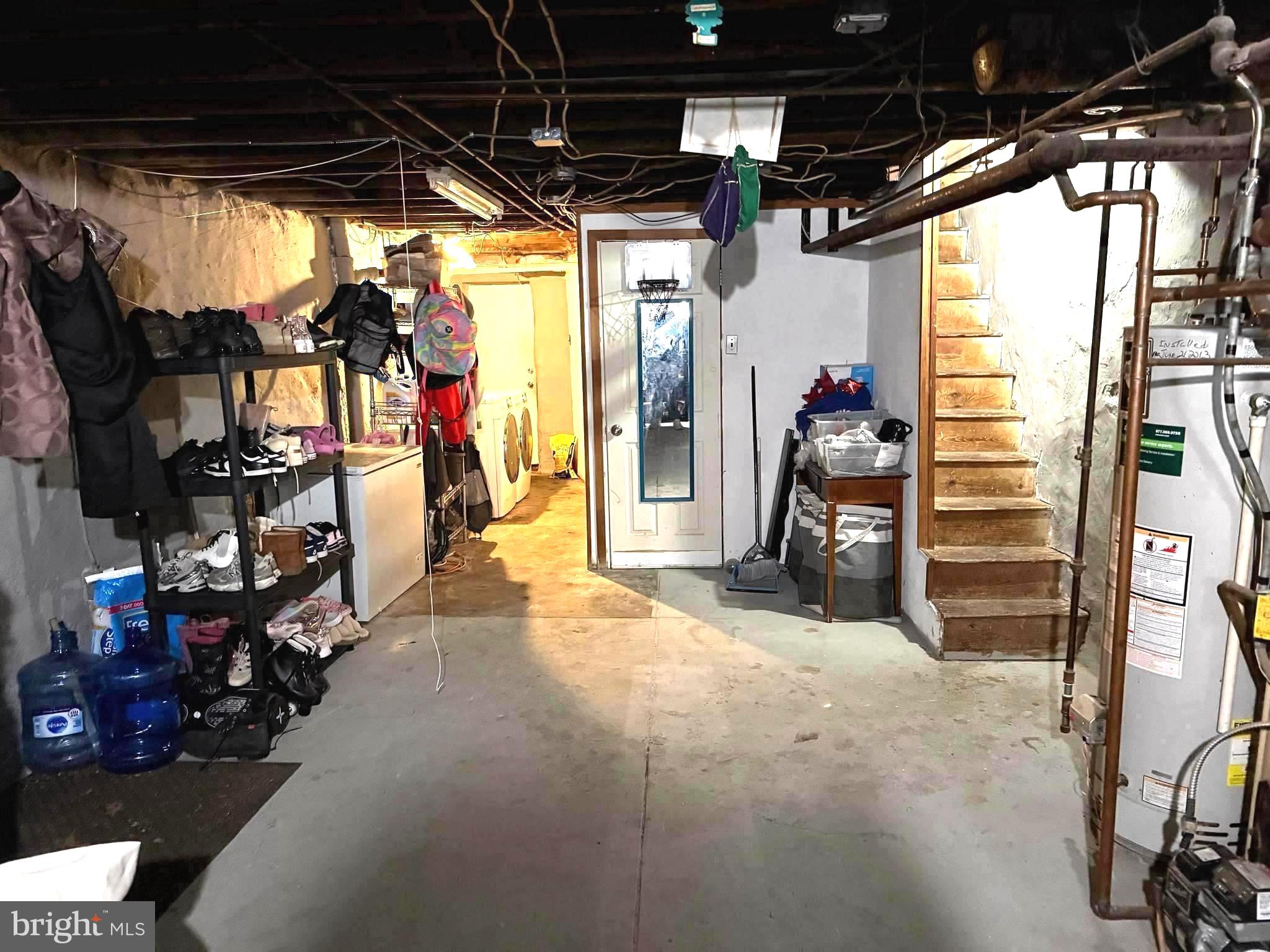 75 Lamport Road Upper Darby, PA 19082 - Photo 16 of 17 Spacious basement with potential charm.