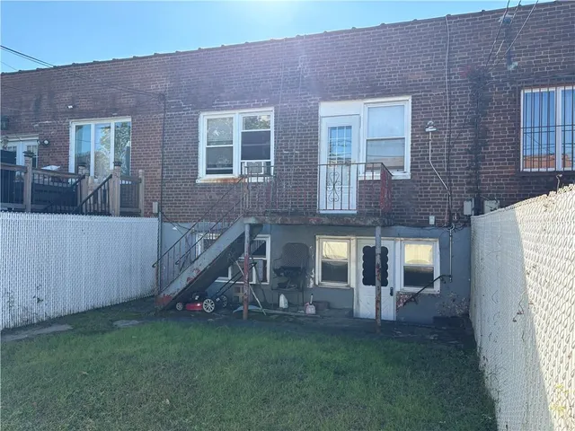 a view of backyard of a house