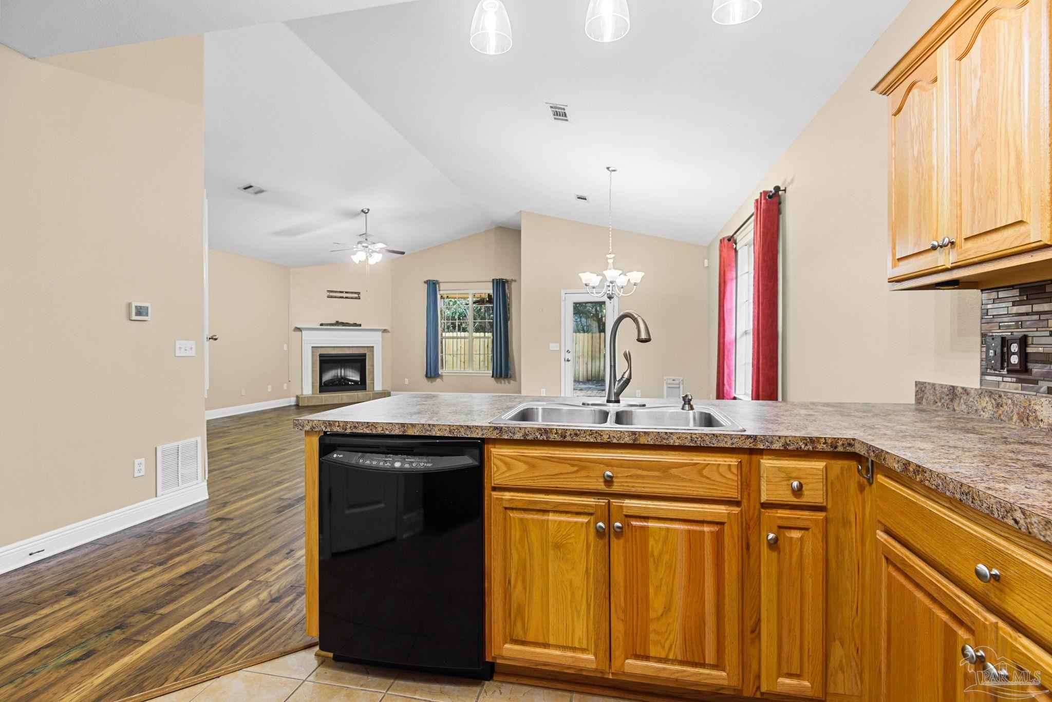 1007 Patriot Place Pensacola, FL 32534 - Photo 20 of 40 a kitchen with sink and cabinets