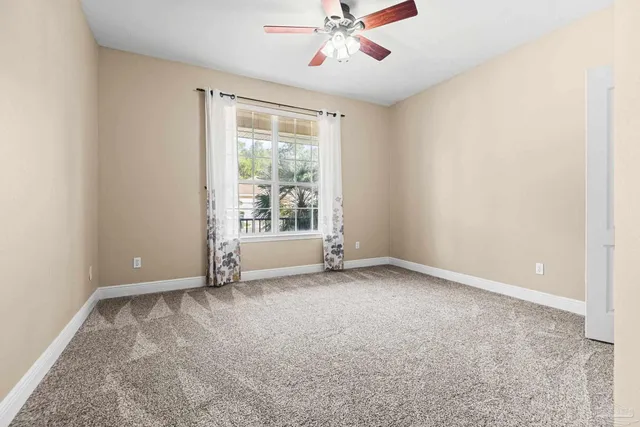 an empty room with fan