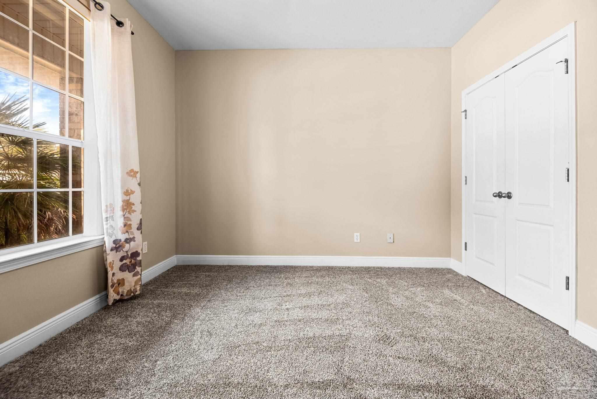 1007 Patriot Place Pensacola, FL 32534 - Photo 28 of 40 an empty room with windows