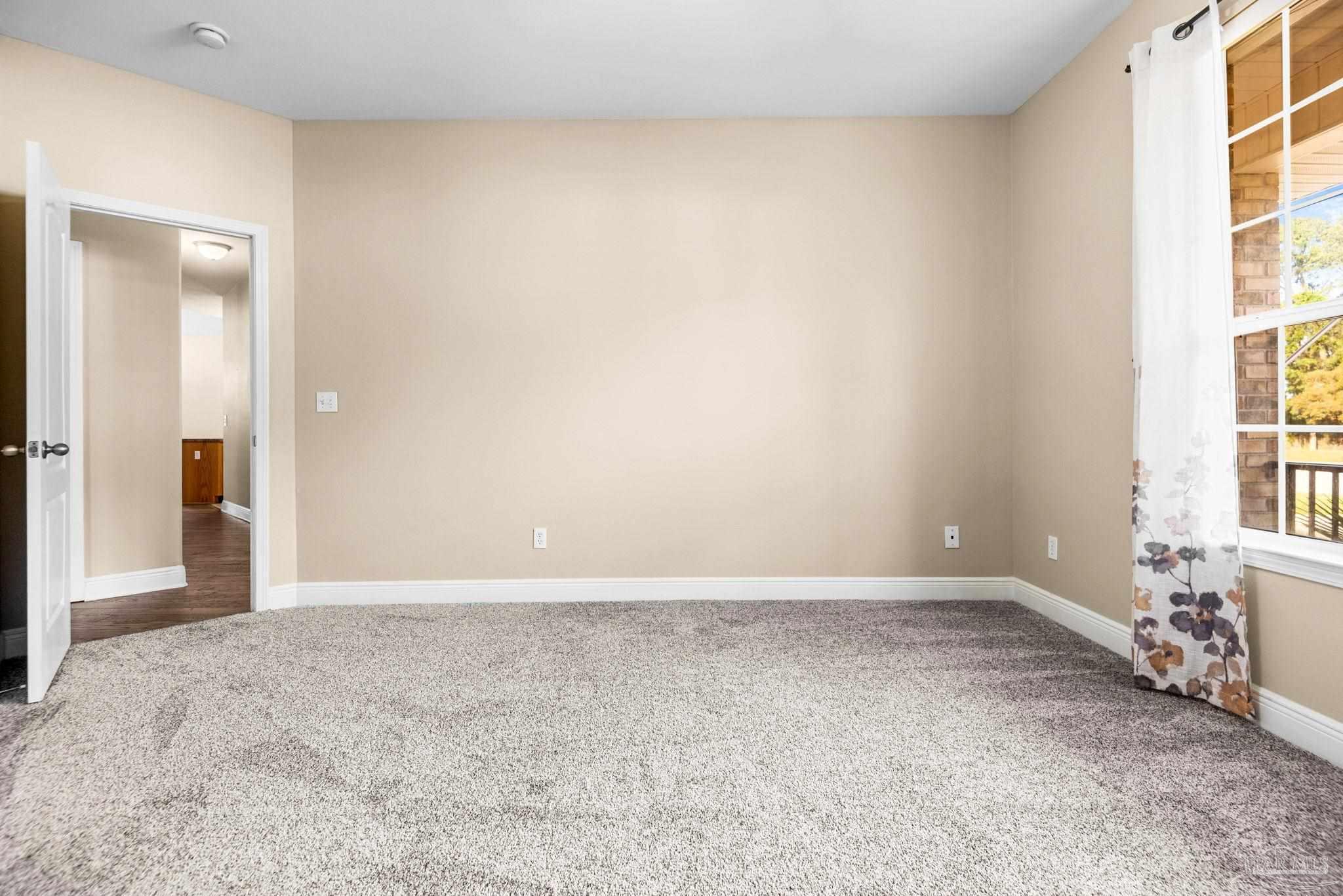 1007 Patriot Place Pensacola, FL 32534 - Photo 29 of 40 a view of an empty room with a window
