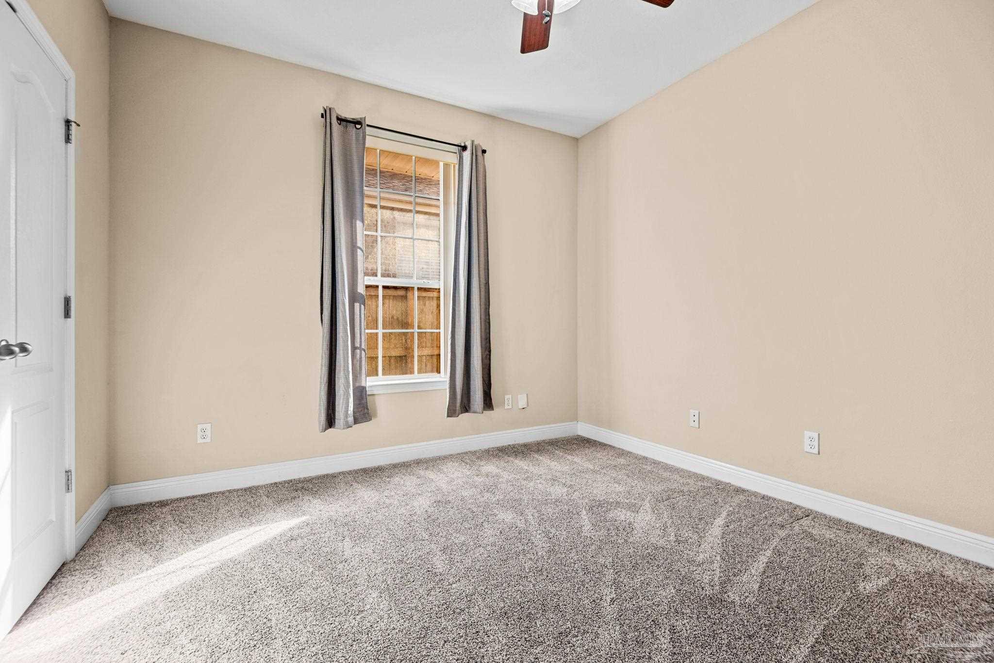 1007 Patriot Place Pensacola, FL 32534 - Photo 30 of 40 an empty room with windows