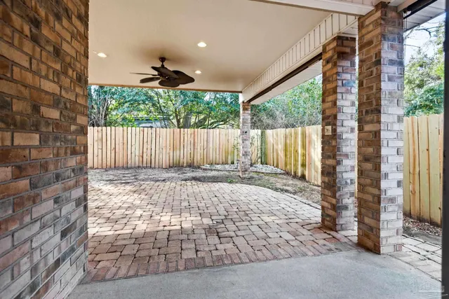 a backyard of a house with lots of green space