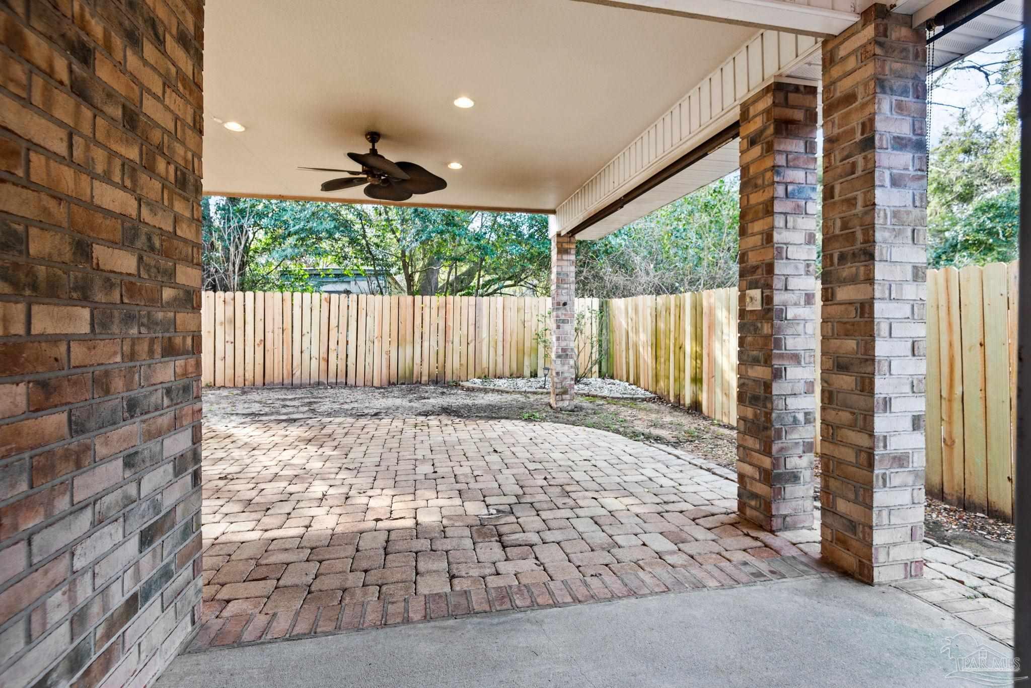 1007 Patriot Place Pensacola, FL 32534 - Photo 35 of 40 a backyard of a house with lots of green space