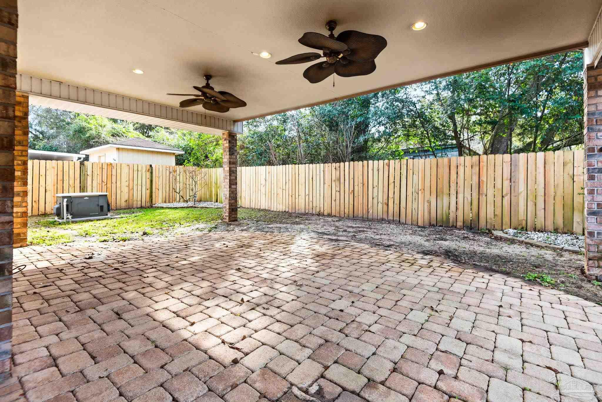 1007 Patriot Place Pensacola, FL 32534 - Photo 36 of 40 a view of a backyard