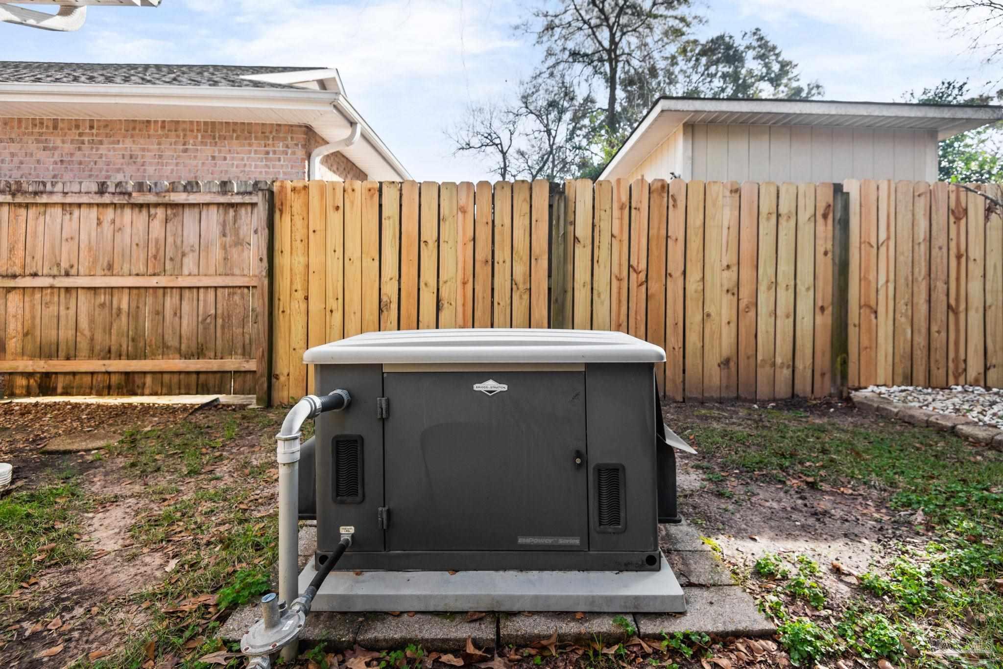 1007 Patriot Place Pensacola, FL 32534 - Photo 39 of 40 a view of a small house with backyard