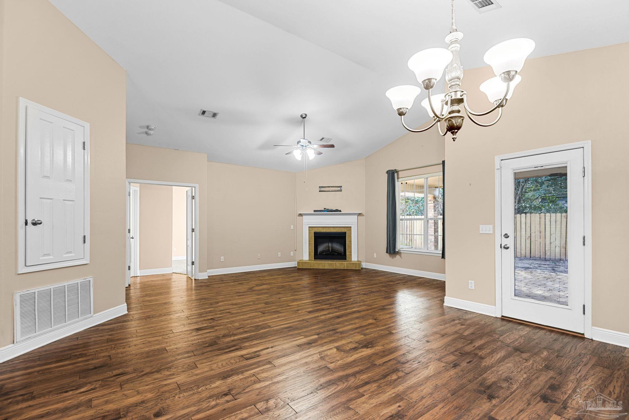 1007 Patriot Place Pensacola, FL 32534 - Photo 8 of 40 a view of a livingroom with a ceiling fan window and wooden floor