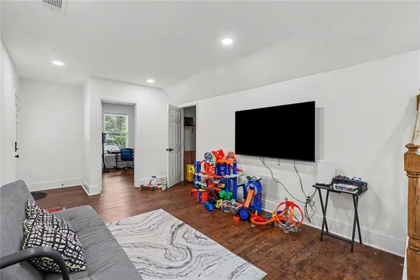 a living room with furniture and a couch
