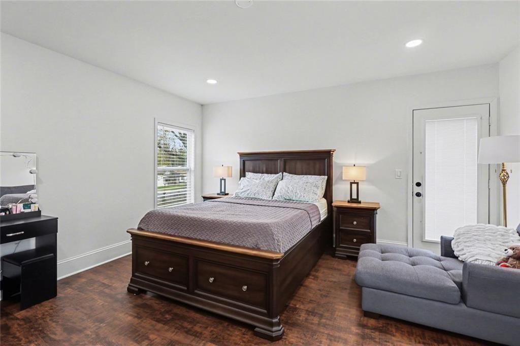417 Pennington Avenue Southwest Rome, GA 30161 - Photo 22 of 30 a bedroom with a bed and a couch