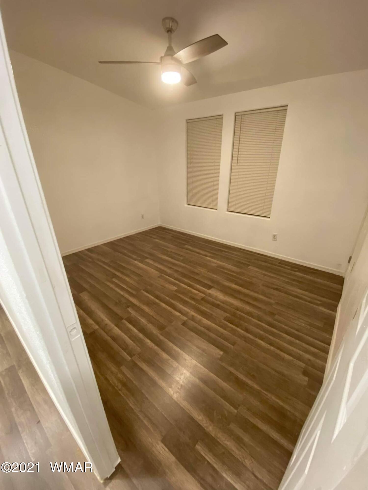 181 River Spings Ranch St. Johns, AZ 85936 - Photo 24 of 60 a view of empty room with wooden floor