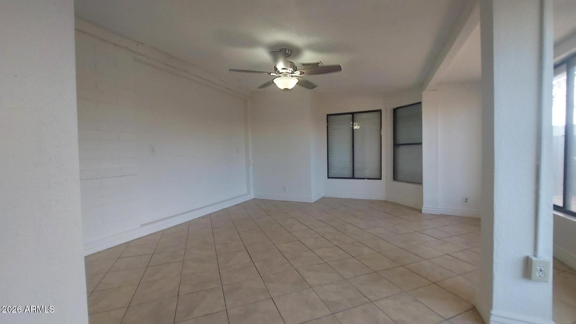 2448 West Freeway Lane Phoenix, AZ 85021 - Photo 13 of 27 a view of empty room with fan