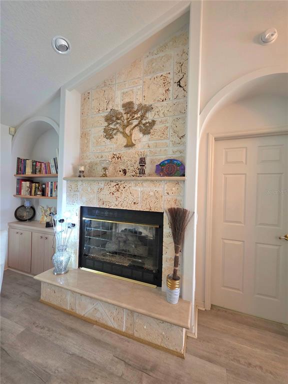 93 Hickory Loop Ocala, FL 34472 - Photo 5 of 23 a living room with a fireplace and a window