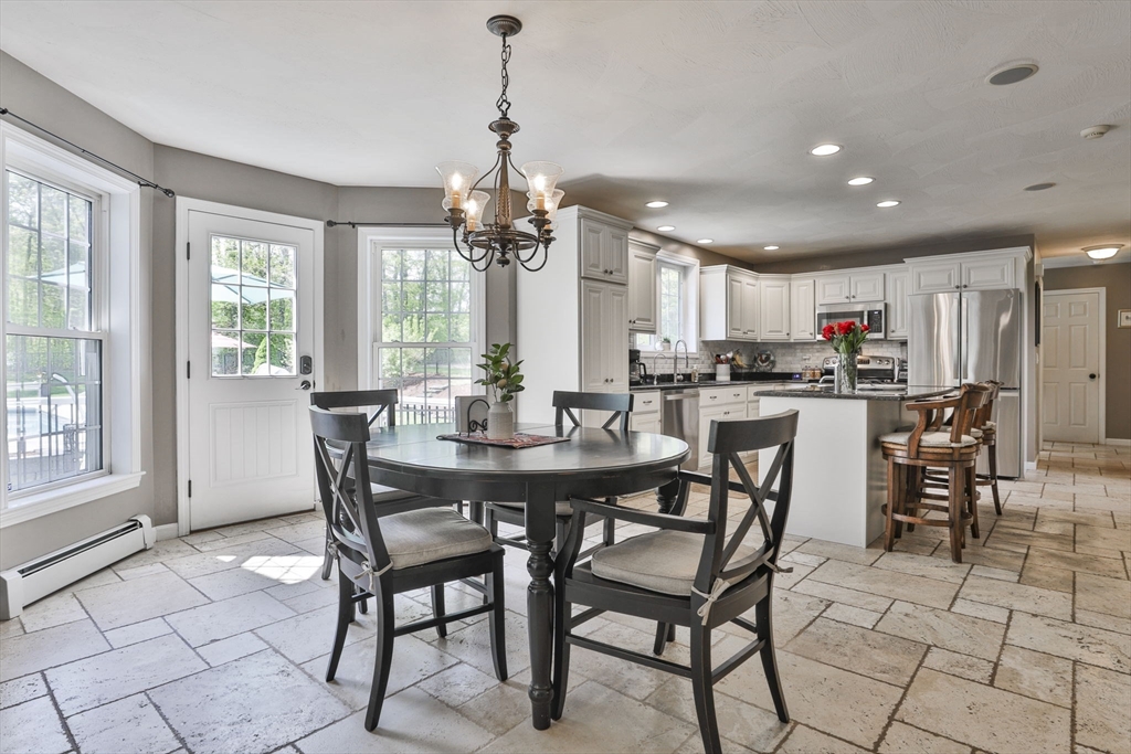 32 Glance Road Windham, NH 03087 - Photo 12 of 42 a view of a dining room and livingroom view