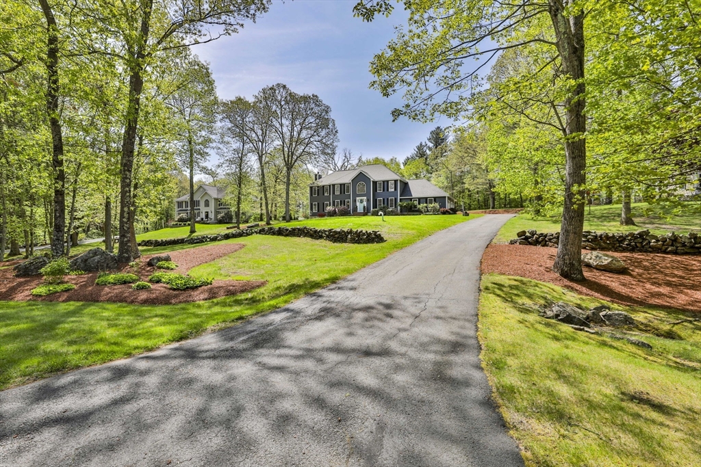 32 Glance Road Windham, NH 03087 - Photo 2 of 42 a view of a park with large trees