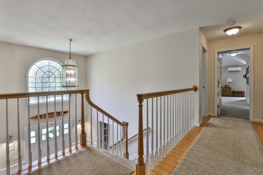 32 Glance Road Windham, NH 03087 - Photo 22 of 42 a view of a hallway view with staircase